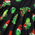 Black fabric with green Christmas tree and red Santa Claus print